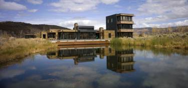 Walden House - Edwards, CO - Exterior photo of building and lake - Selldorf Architects