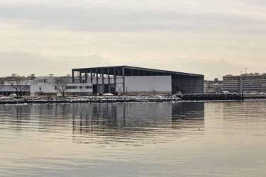 SIMS Material Recovery Facility - Brooklyn NY - Exterior photo of building by water - Selldorf Architects