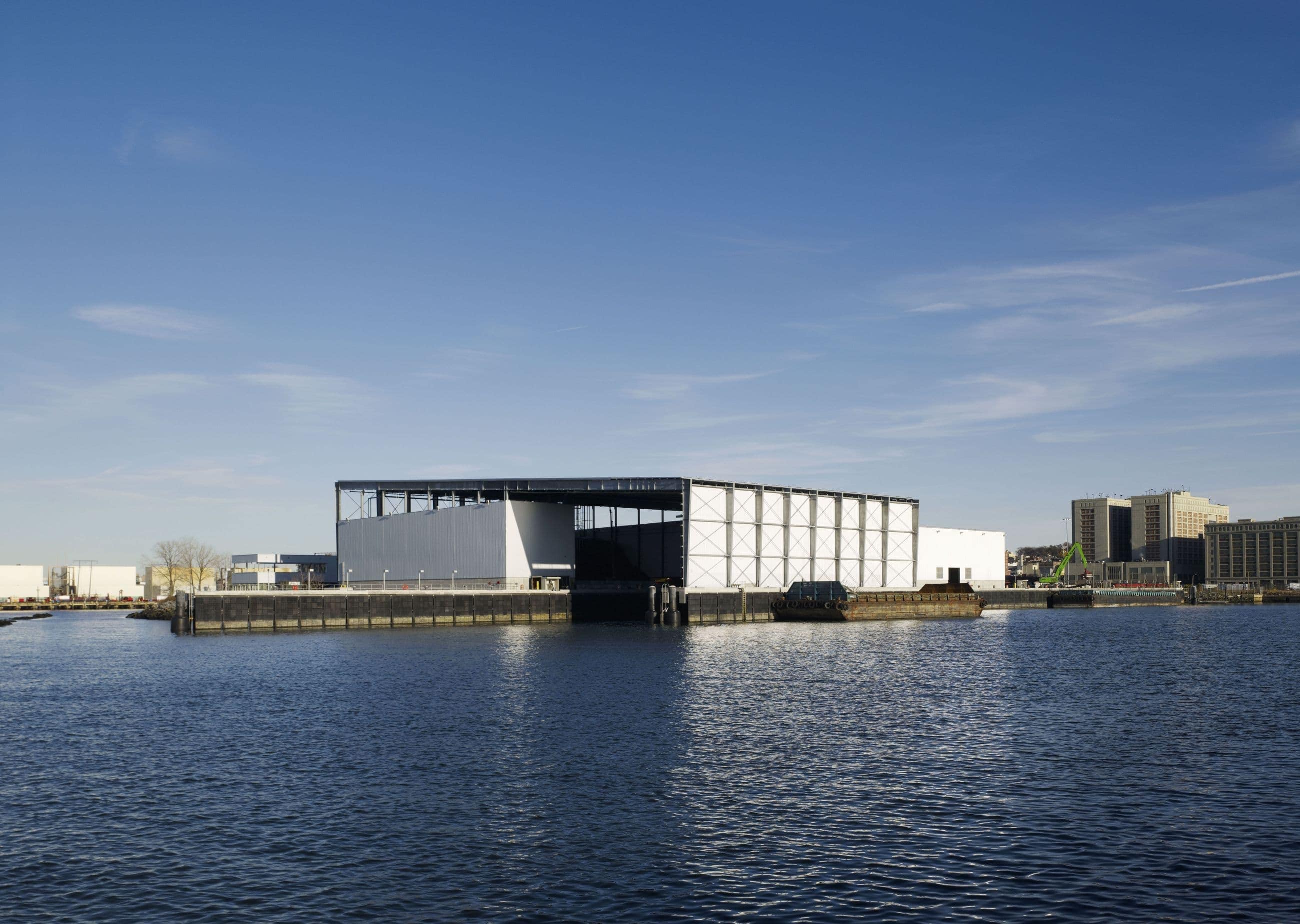 SIMS Material Recovery Facility - Brooklyn NY - Exterior photo of building by water - Selldorf Architects
