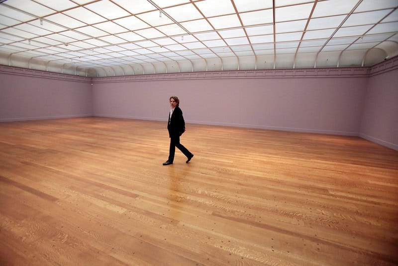 Photo of Annabelle Selldorf in an empty gallery room of the Clark Art Institute