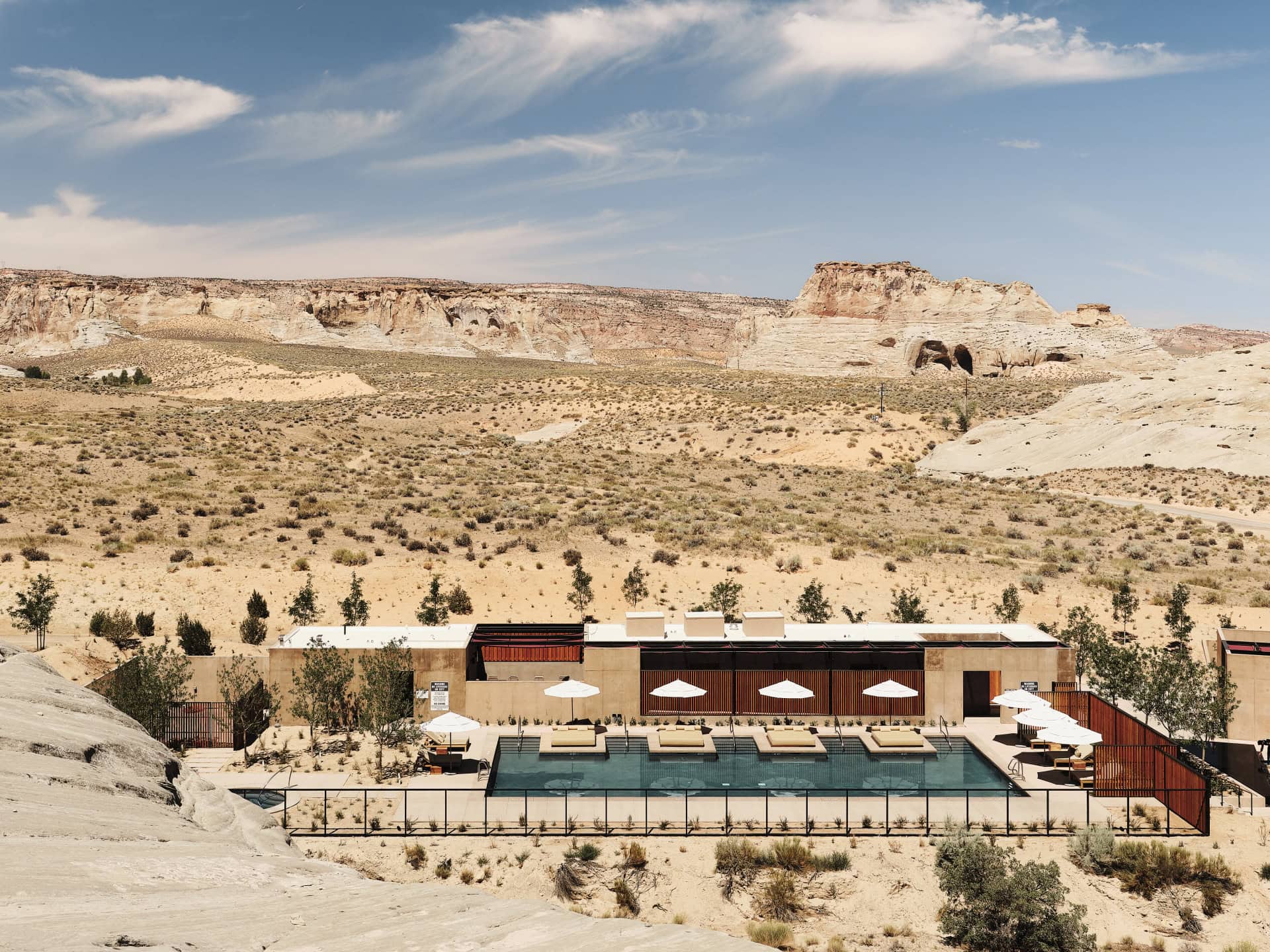 Commons Building at Camp Sarika by Amangiri - Main pool aerial view - Selldorf Architects